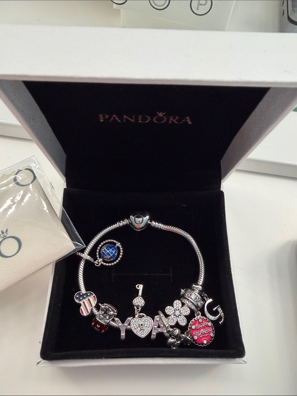 Pandora Silver Bracelet with Red, Blue and White Charms
